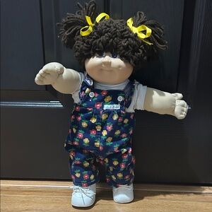 Cabbage Patch Doll with Re-Rooted brown pigtails and violet eyes
